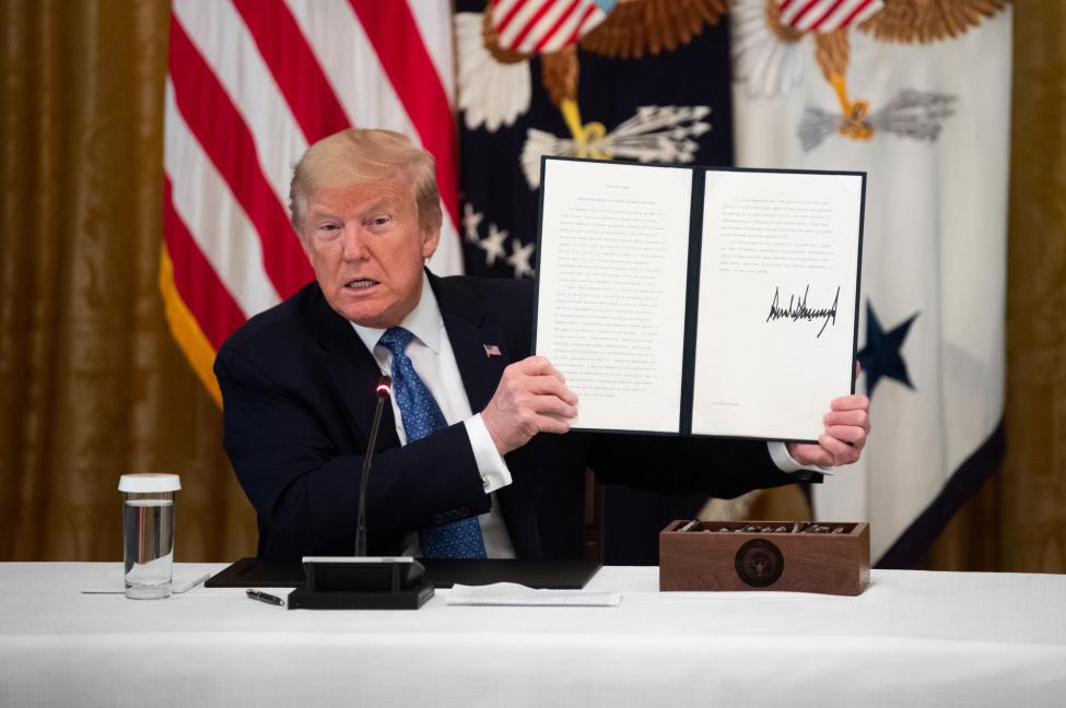 Trump signs